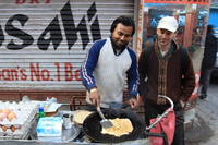 Dave getting roti. (Category:  Travel)