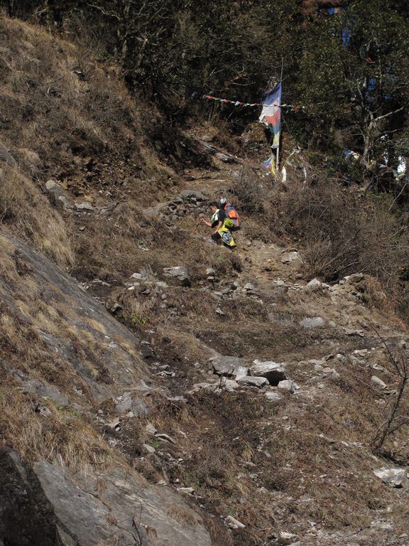 Young climbing a steep hill. (Category:  Travel)