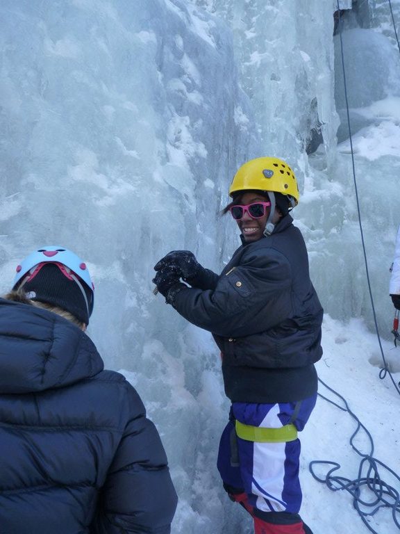 Briana placing a screw. (Category:  Ice Climbing)