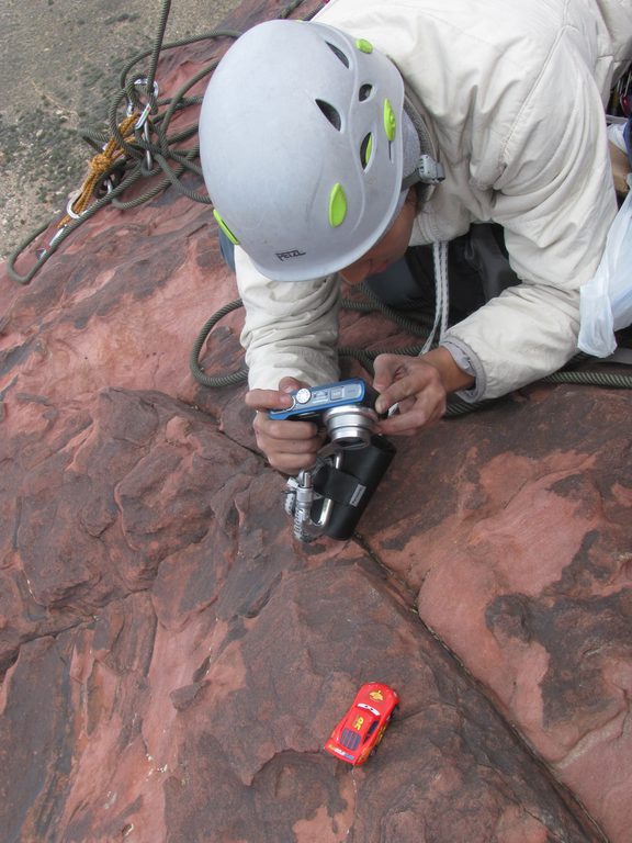 Allison photographing Lightning McQueen on top of Crimson. (Category:  Rock Climbing)