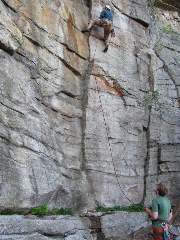 Guy leading Nosedive at the end of the day. (Category:  Rock Climbing)