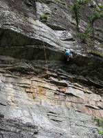 Tammy gracefully heel hooking through the roof. (Category:  Rock Climbing)