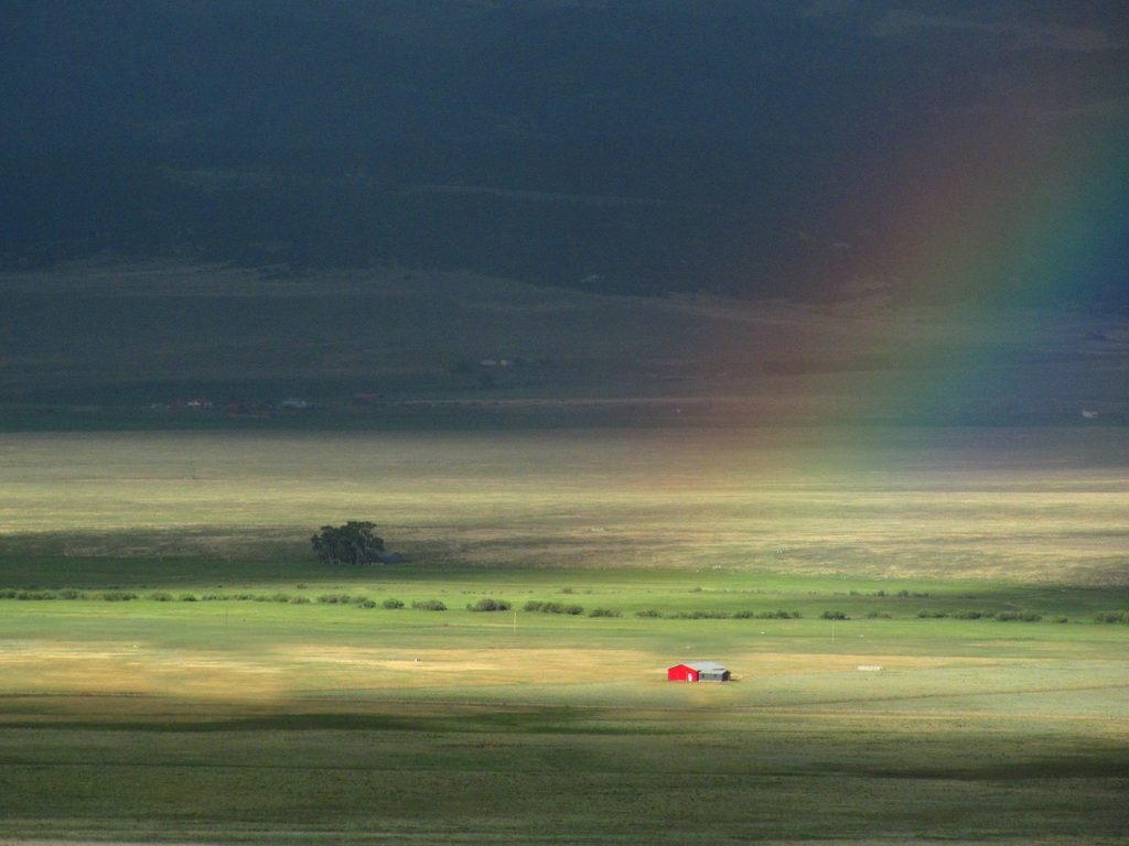 It is a farmhouse... and a rainbow. (Category:  Rock Climbing)