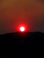 Smoke from a distant forest fire gave us a stunning sunset. (Category:  Rock Climbing)