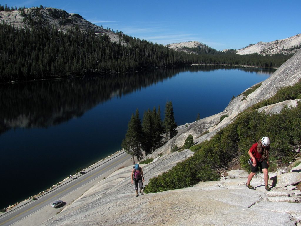 Beth and Mike walking to the base of Stately Pleasure Dome. (Category:  Rock Climbing)