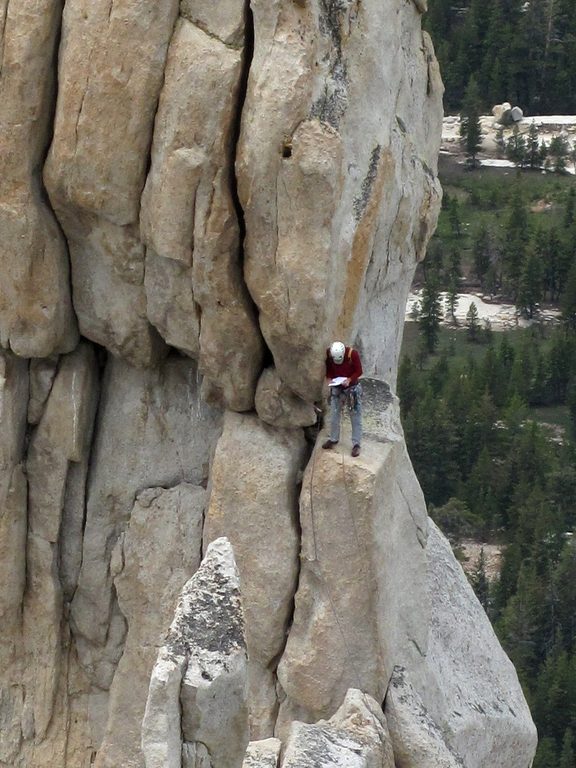 Checking the topo... (Category:  Rock Climbing)