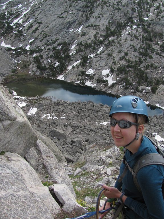 Beth belaying the start of the East Face. (Category:  Rock Climbing)