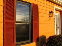 Front of the house with shutters installed. (Category:  Residence)