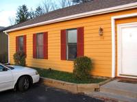 Front of the house with shutters installed. (Category:  Residence)