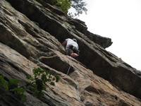 Mark nearing the top of Graveyard Shift. (Category:  Rock Climbing)