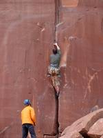Guy leading some 5.9 climb. (Category:  Rock Climbing)