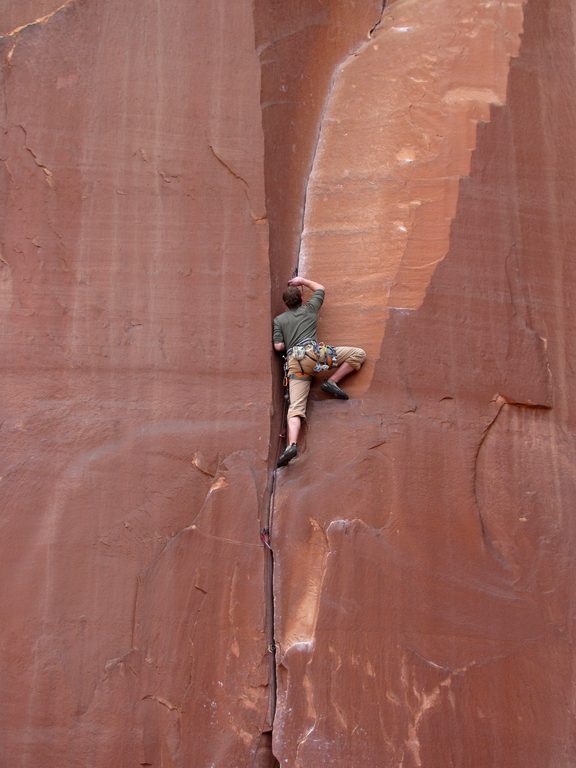 Guy leading some 5.9 climb. (Category:  Rock Climbing)