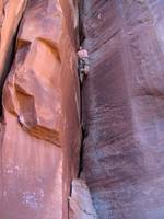 Guy leading Drain Pipe. (Category:  Rock Climbing)