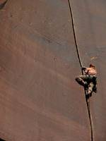 Guy leading Supercrack. (Category:  Rock Climbing)