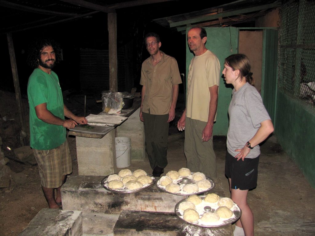 Will, Dan, Tom and Kristin preparing pizza dough. (Category:  Travel)