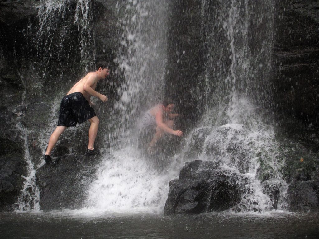 Andrew and Tara playing in the waterfall. (Category:  Travel)