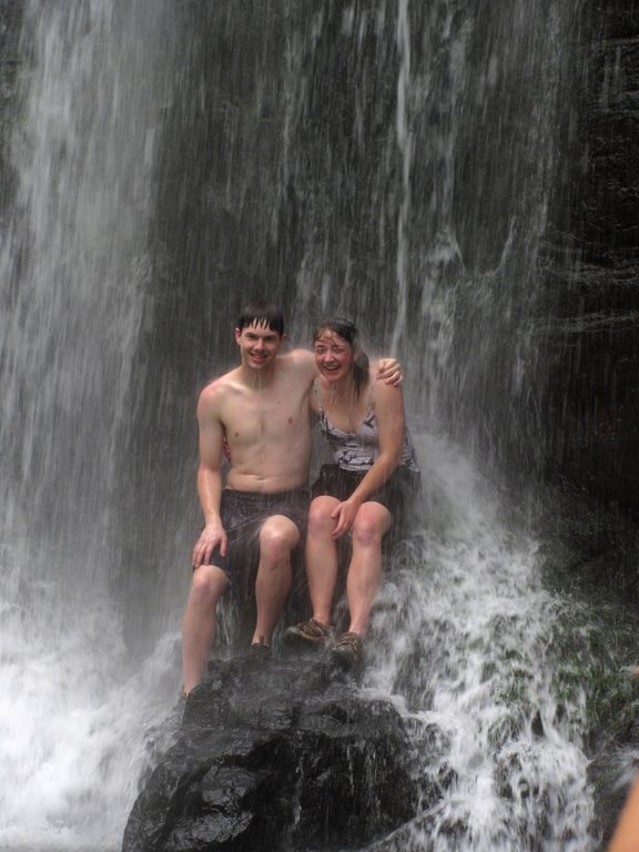 Andrew and Tara playing in the waterfall. (Category:  Travel)