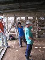 Eric grinding sugar cane. (Category:  Travel)