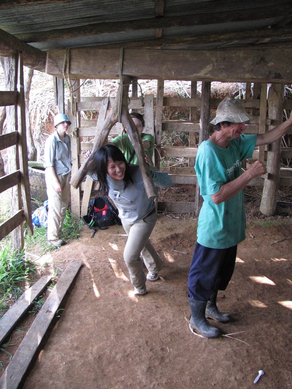 Becky grinding sugar cane. (Category:  Travel)