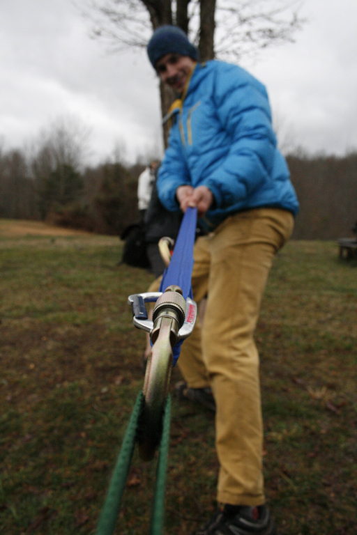 Andrew tightening the slackline. (Category:  Rock Climbing)