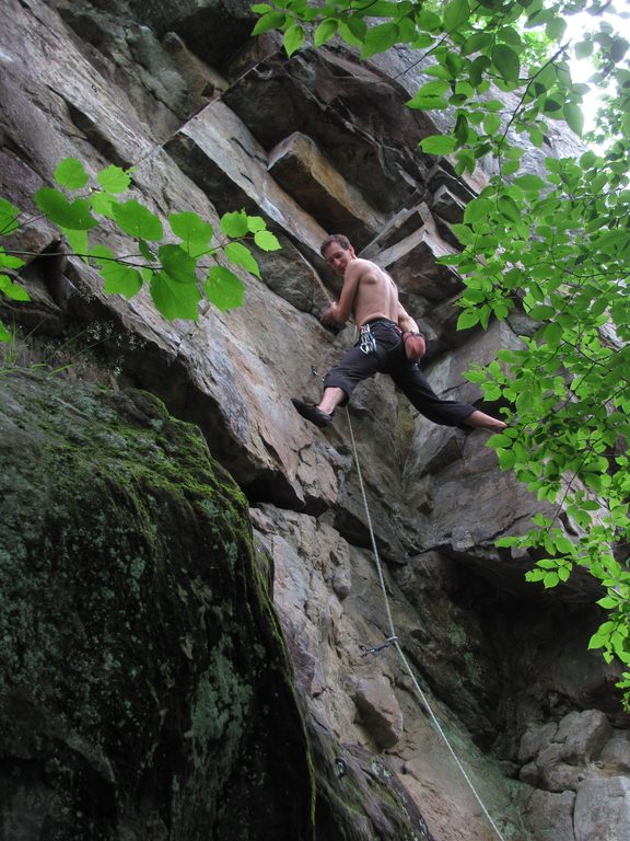 Yamin getting brown sticky stuff on his shoes. (Category:  Rock Climbing)