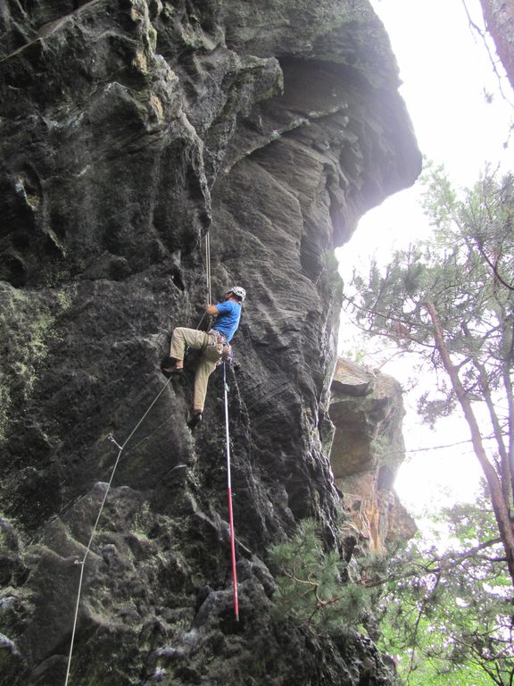 Stick clipping up Noodle. (Category:  Rock Climbing)