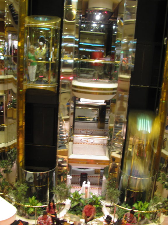 Glass elevators in the atrium. (Category:  Family)