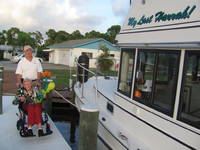 Posing by the boat. (Category:  Family)