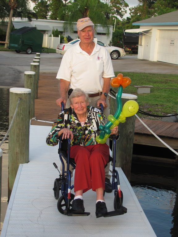 Posing by the boat. (Category:  Family)