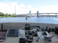 Out on the boat.  Not running aground or into bridges. (Category:  Family)