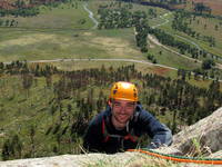 Adam reaching the top of Soler. (Category:  Rock Climbing)