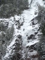 Tammy leading the first pitch of Chouinard's Gully in the middle of a winter storm. (Category:  Ice Climbing)