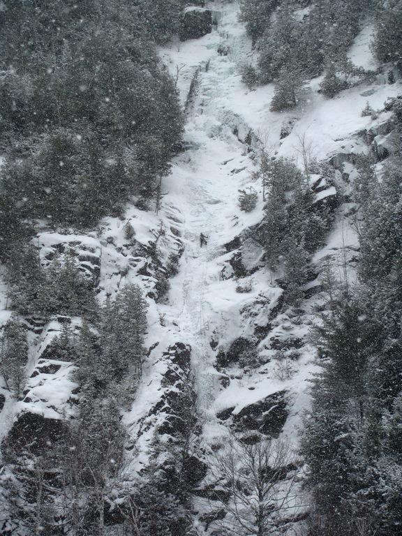 Tammy leading the first pitch of Chouinard's Gully in the middle of a winter storm. (Category:  Ice Climbing)