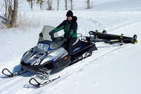 Why do they groom the trails for snowmobiles? (Category:  Skiing)