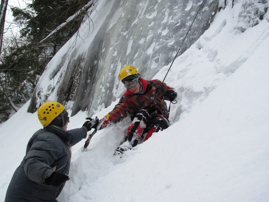 Rachel giving Joe his Clif Bar as a reward for climbing Lions On The Beach. (Category:  Ice Climbing)