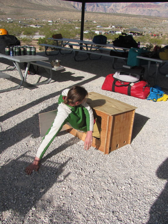 Andrew demonstrating how he stays out of the wind. (Category:  Rock Climbing)