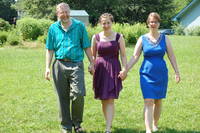 Annie and her parents walked down the aisle. (Category:  Party)