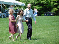 At the same time, Marissa and her parents walked in from the other side. (Category:  Party)