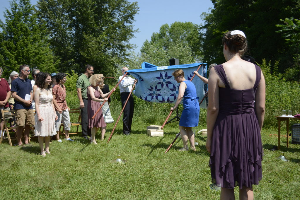 Annie and Marissa's parents held the four poles of the huppah, or wedding canopy. (Category:  Party)