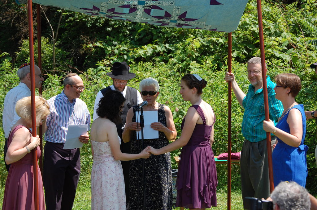 Marilyn led the assembled in a holding-hands prayer. (Category:  Party)