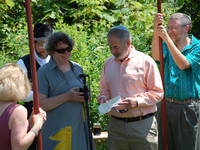 Ina and Jay read the first blessing. (Category:  Party)