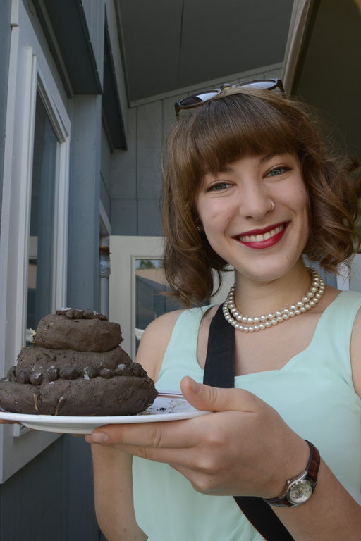 Sarah, Annie's sister and the official wedding superhero, curated not only the edible wedding cakes, but also the mud ones. (Baking credit for the mud cake goes to Avital and Emma.) (Category:  Party)