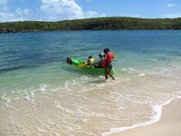 Getting ready to paddle into the big waves at the mouth of the bay. (Category:  Family)