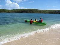 Getting ready to paddle into the big waves at the mouth of the bay. (Category:  Family)