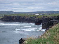 One of the hostelers in Dingle recommended a dirt road along the cliffs for 2 km leading up to the Cliffs of Moher, and said she thought we could probably bike it (Category:  Travel)