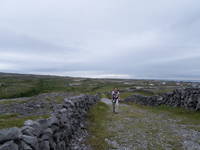 We biked partway to the Black Fort but had to switch to walking when the path got too gravelly. Here, Marissa is walking up the path (Category:  Travel)