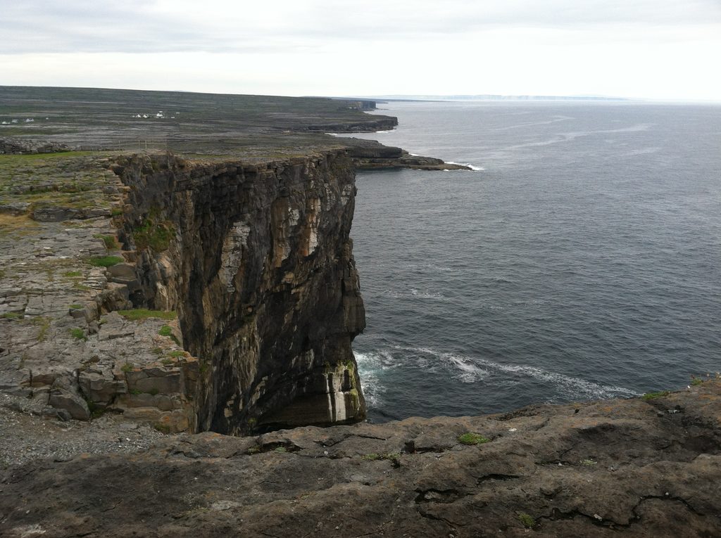 Dun Aengus is directly on the sea cliffs, but instead of a protective fence for the people, the only fence we saw was perpendicular to the cliffs, keeping the grazing animals out (Category:  Travel)