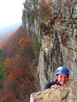 Gretchen reaching the High E ledge (Category:  Rock Climbing)