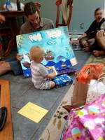 Not sure if Lucas appreciated the pirate theme, but he likes wrapping paper. (Category:  Party)