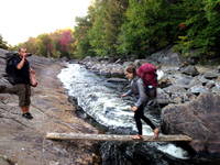 Emily crossing the plank (Category:  Rock Climbing)